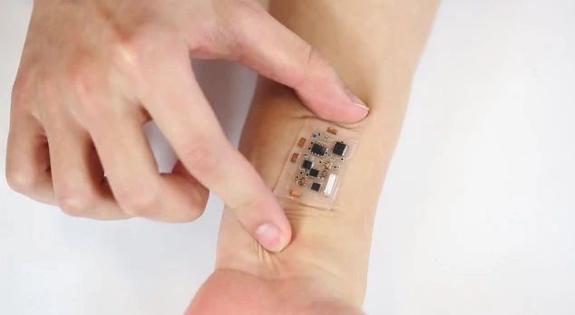 Stick-on patch moves with the skin (Photo: John A. Rogers)