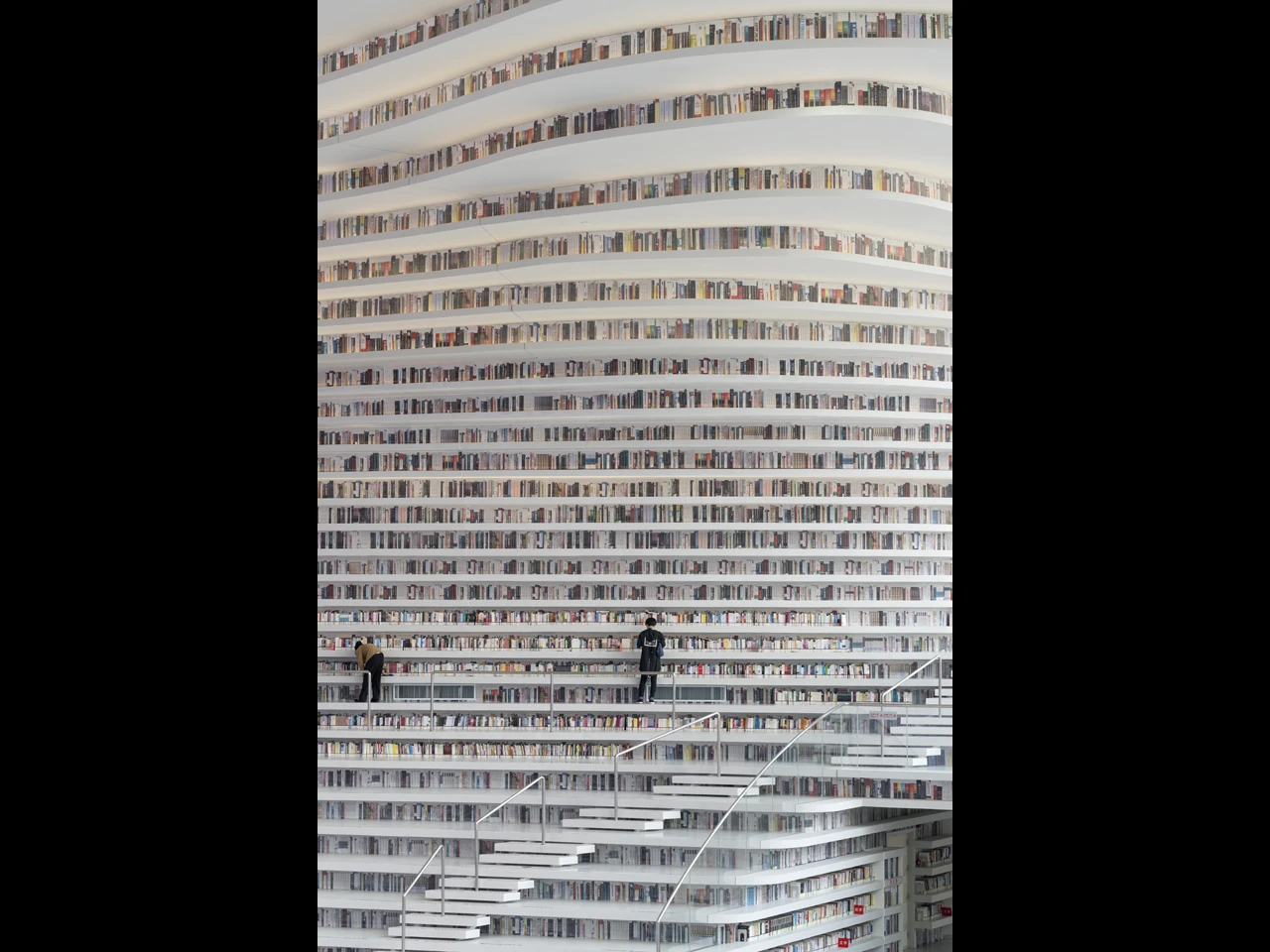 Unfortunately the upper shelf books are fake