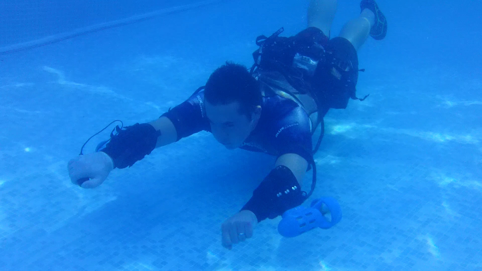 The Underwater Jet Pack is designed to let users perform underwater acrobatics using forearm thrusters