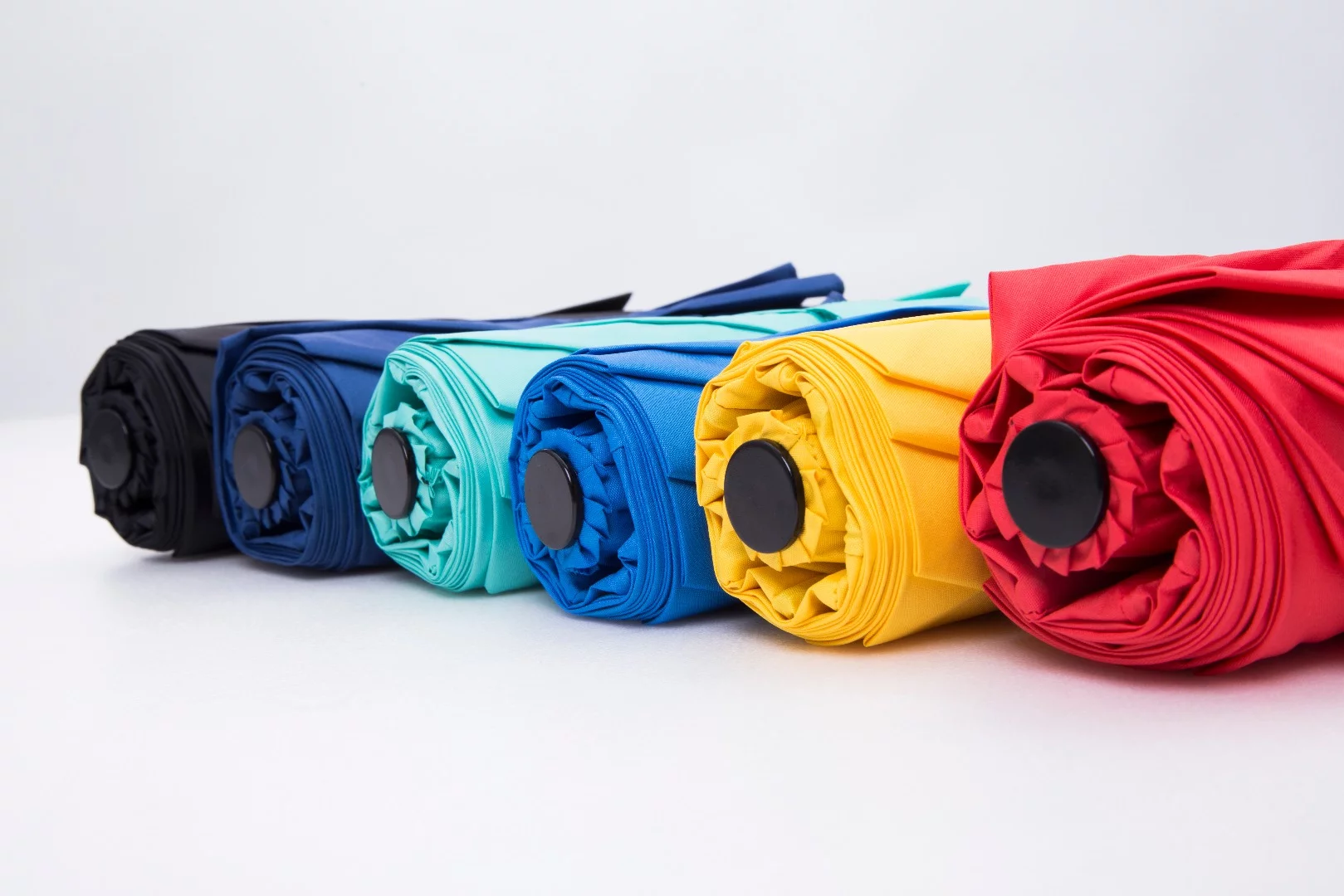 The Haz Umbrella is available in black, navy blue, royal blue, yellow, green, and red