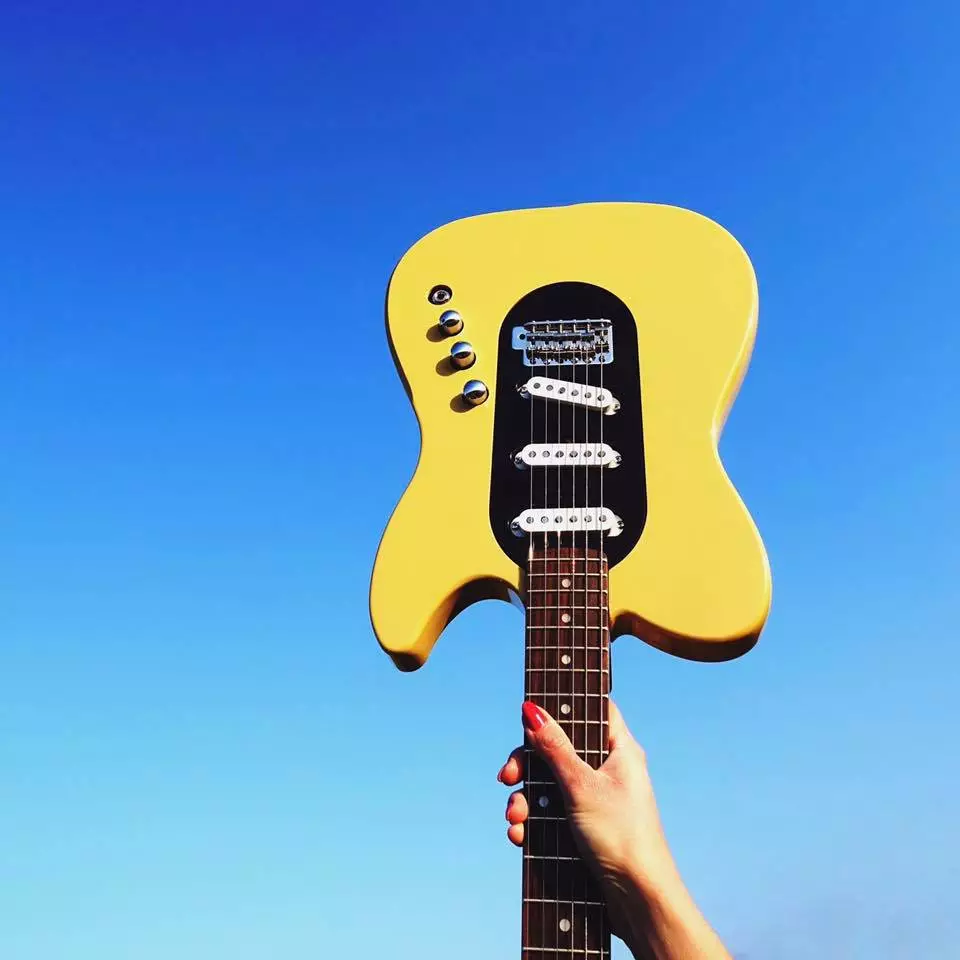 A blonde Tele outer shape with a Jan three pickup body core