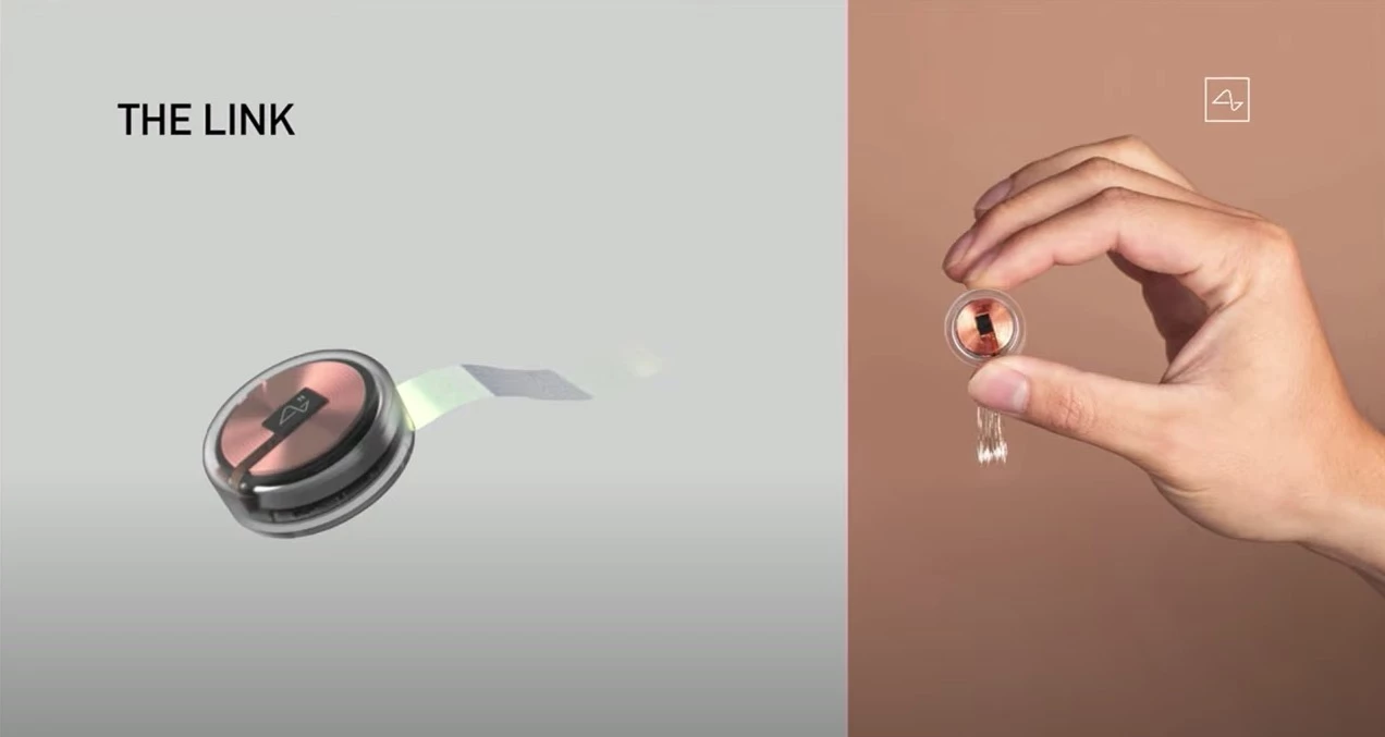 The Link device, around the size of a coin