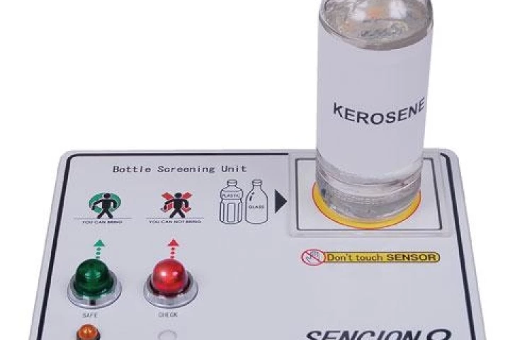 Sellex's Sencion thread liquids detector - the flashing red light indicates the presence of a threat liquid like Kerosene.