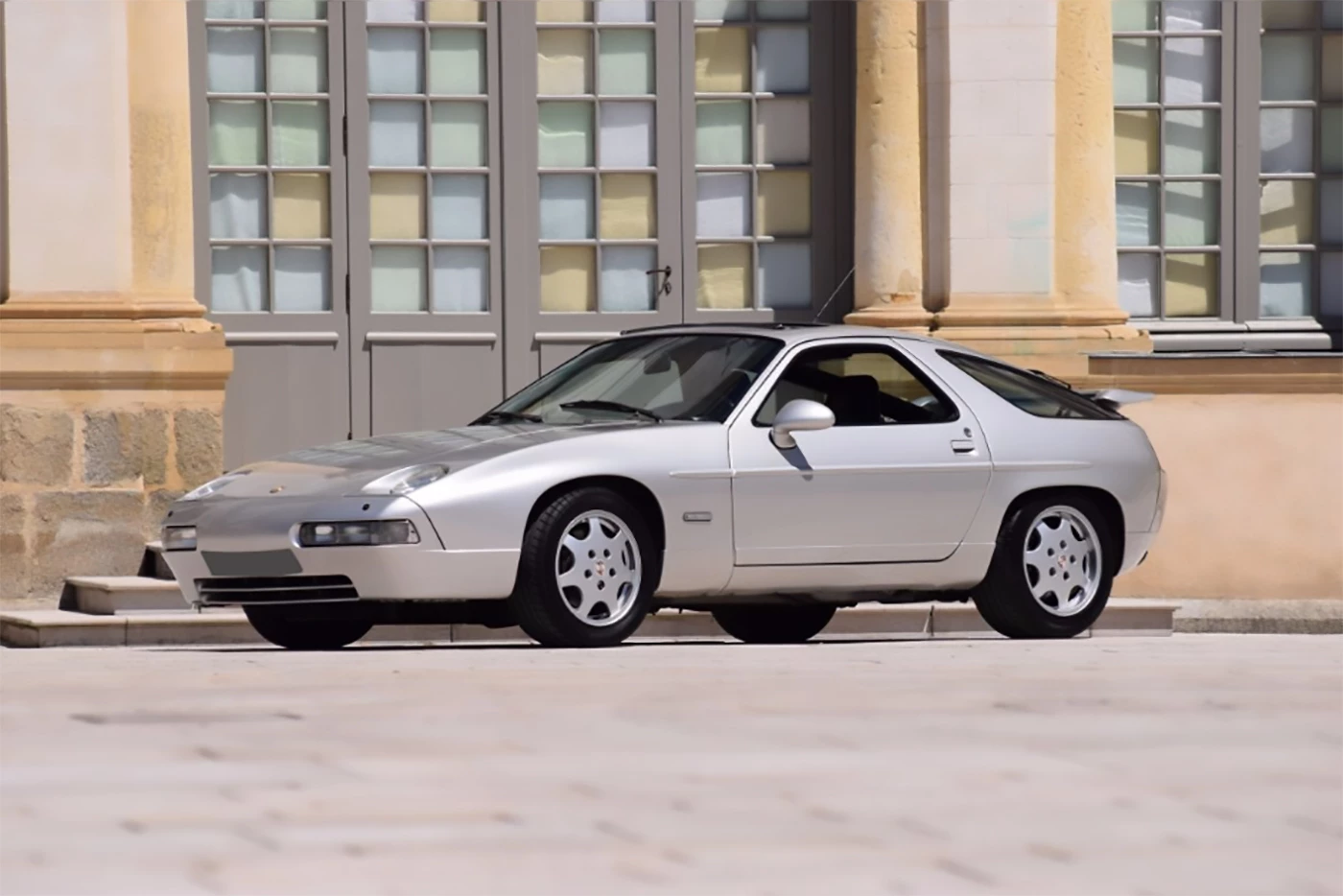 Artcurial Monaco July 2, 2017 Auction: A rare GT version of the 928 with factory sunroof and leather interior, a recent coat of paint and a general freshen. The most significant aspect of the car is that it was sold new to Johnny Hallyday, the French Elvis, so it will retain its value better than most. Auction Description
