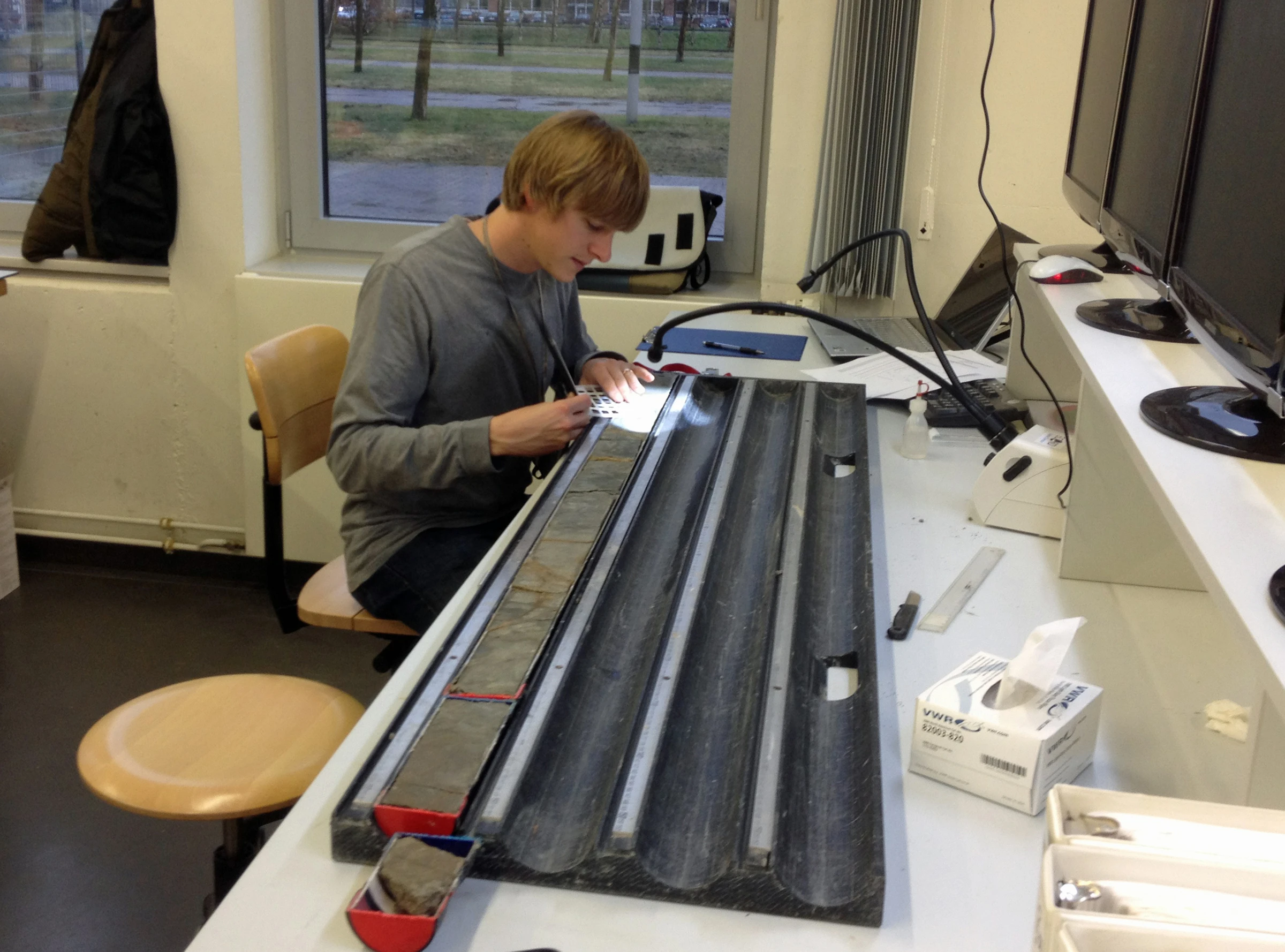 Lead author of the study, Gabe Bowen, working on Wyoming sediment cores at a lab in Germany (Photo: Gabe Bowen, University of Utah)