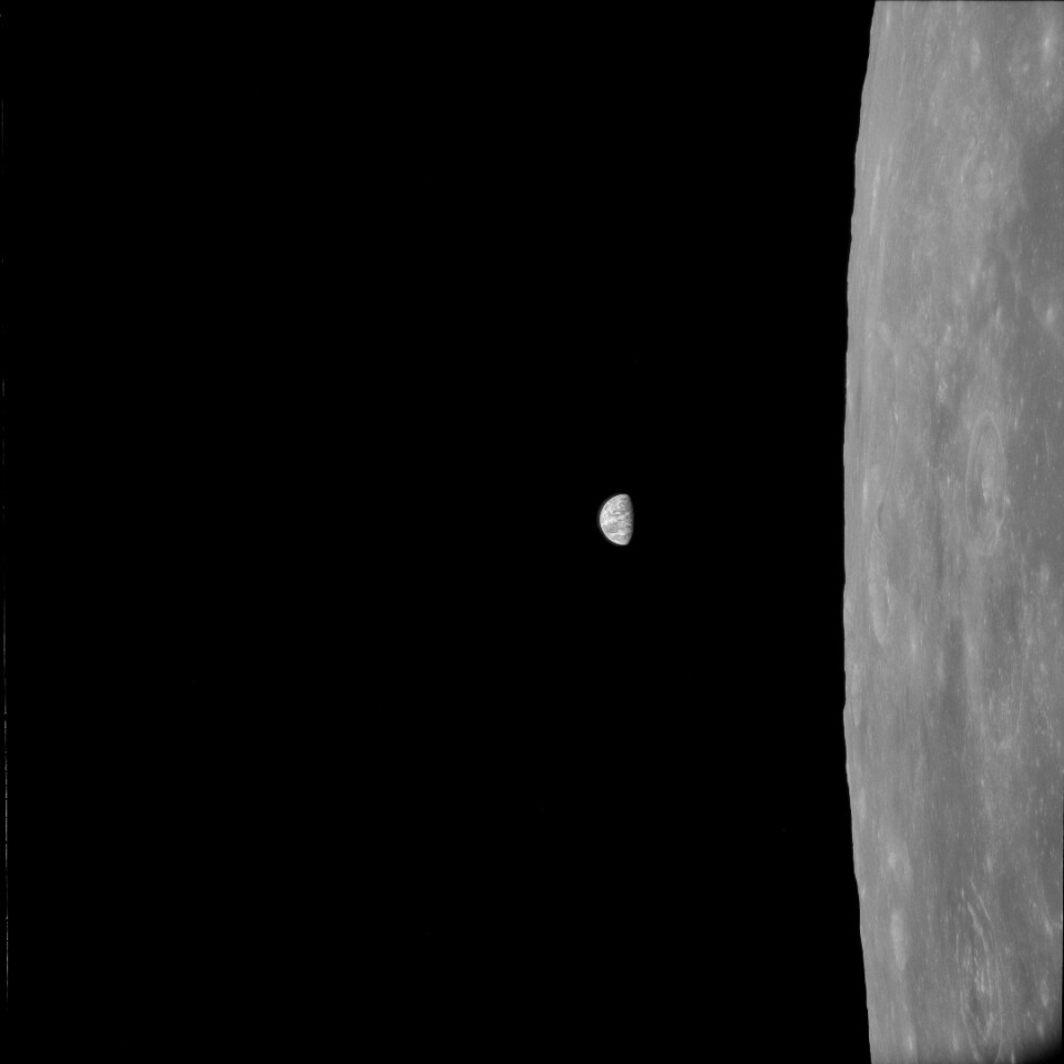 Processed Hasselblad footage of the Earth hanging over the lunar surface as captured during the historic Apollo 11 mission