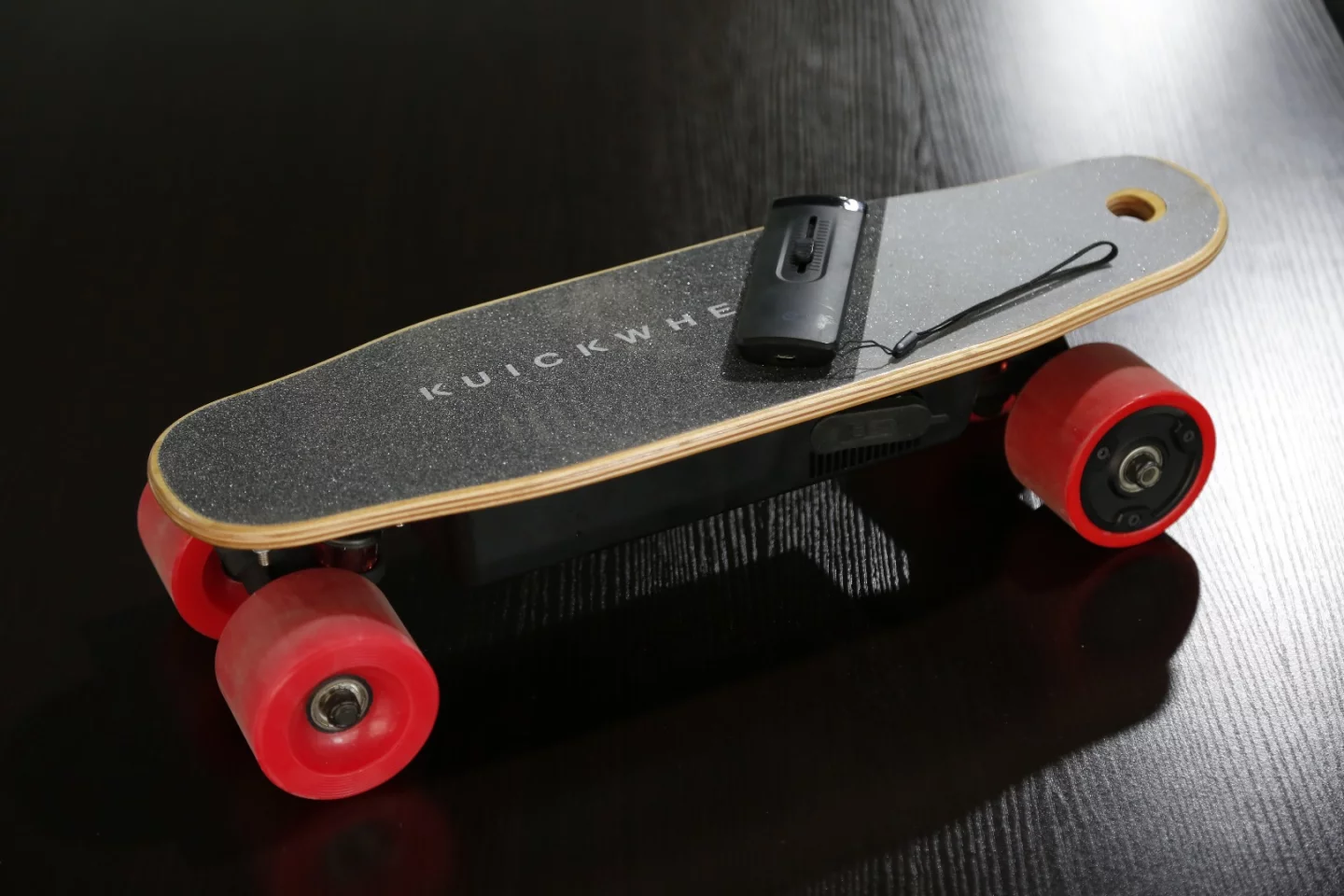 The force-sensitive controller for the Kuickwheel Serpent-C also acts as a "dead man's switch" to stop the board should the rider stop controlling