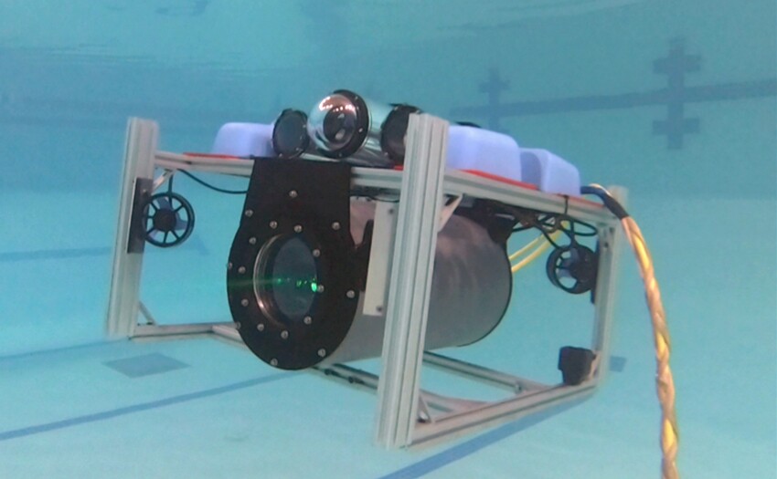 Staff performed tests with the undersea optical communications system at the Boston Sports Club pool in Lexington