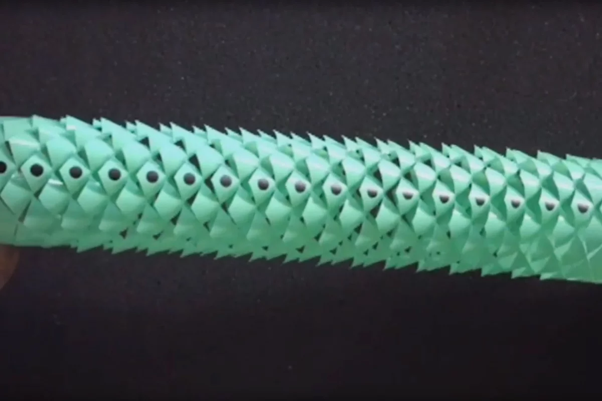 Researchers at Harvard have enhanced the speed and accuracy of their snake-inspired soft robot by changing the shape and pattern of its kirigami shell