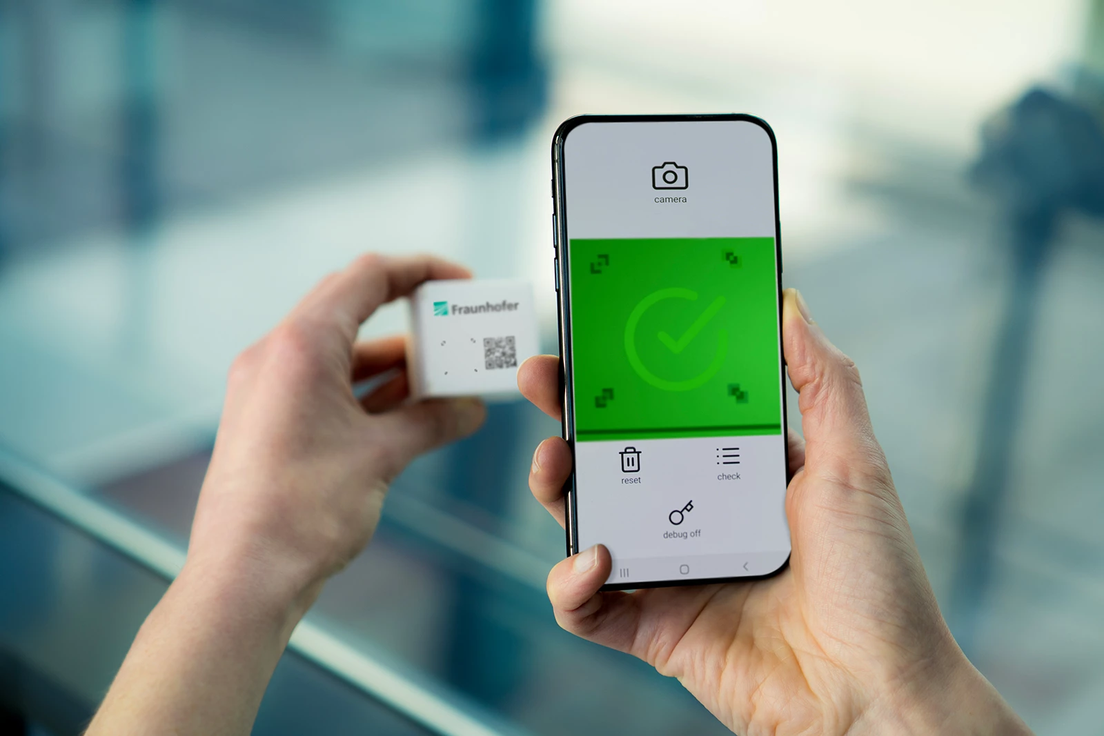 SmartID QR codes, along with the surface texture of the packaging, can be read by users' smartphones