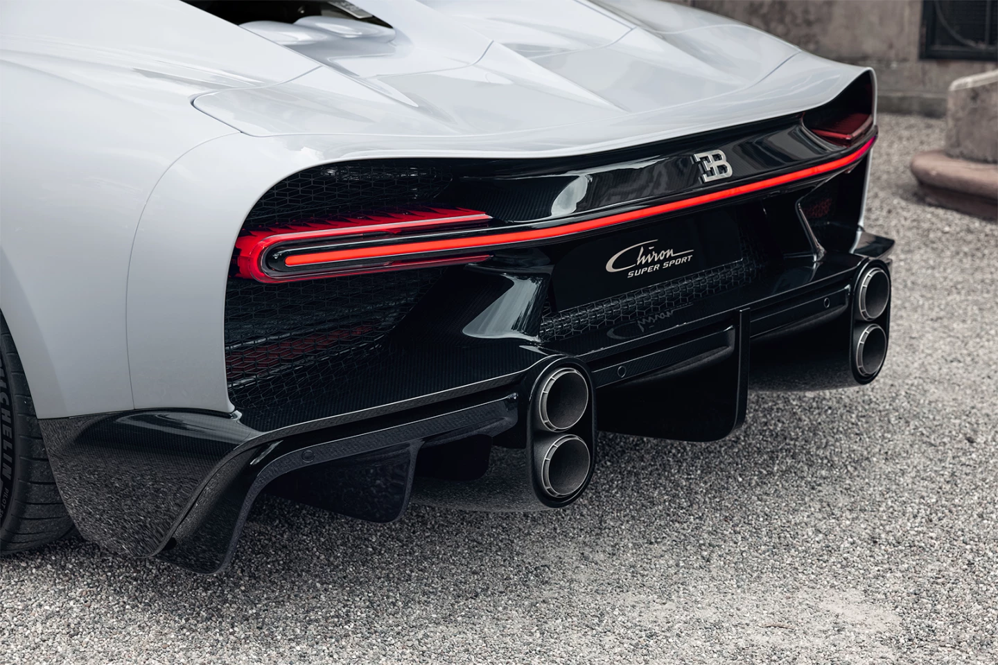 Bugatti gives the Chiron Super Sport a broad, level rear diffuser and vertical exhaust tips