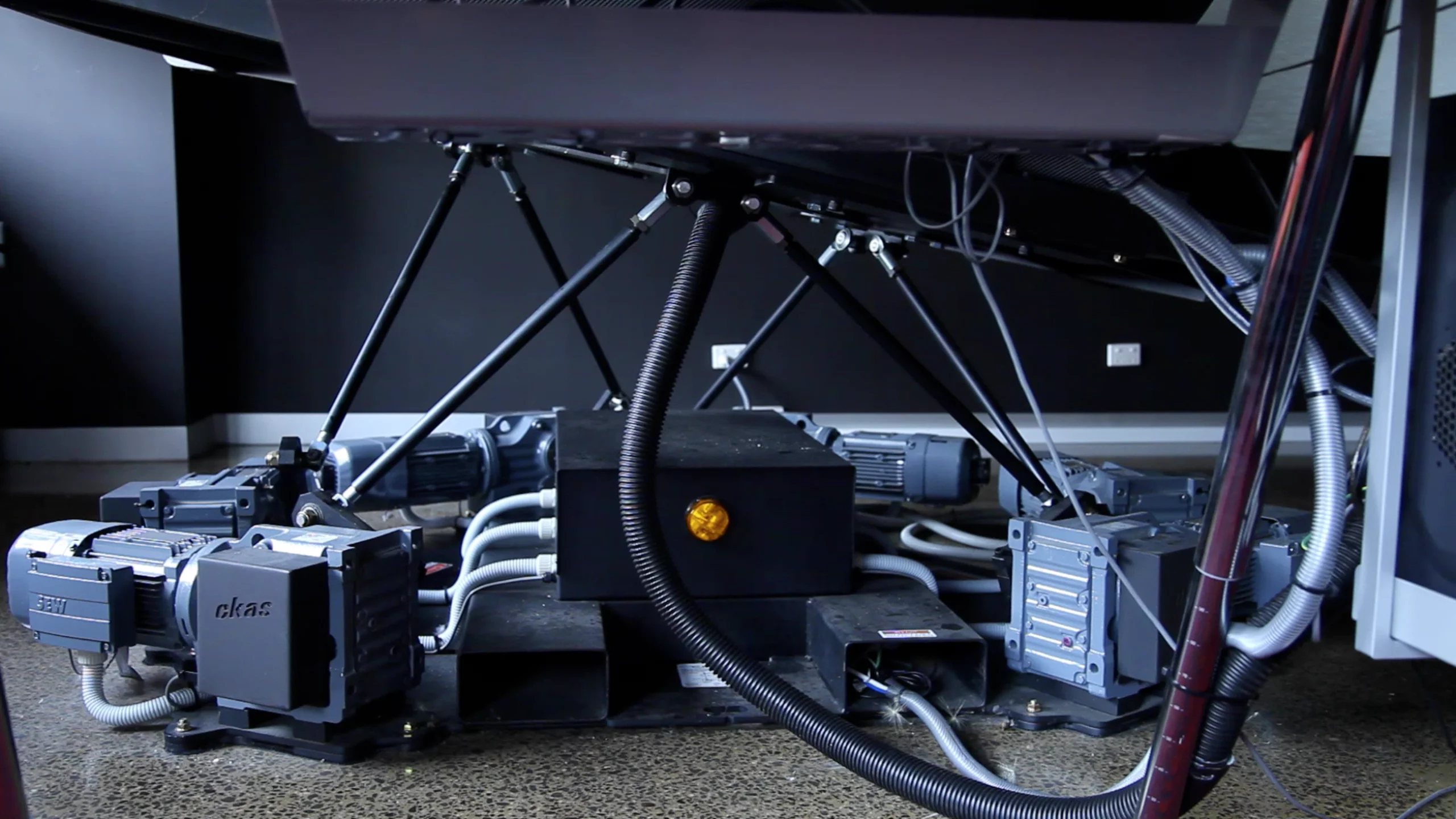 Six servo motors control movement of the motion platform