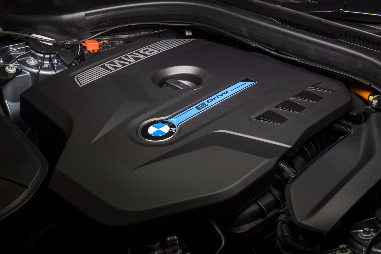 The four cylinder in the 530e works in tandem with an electric motor mounted ahead of the gearbox