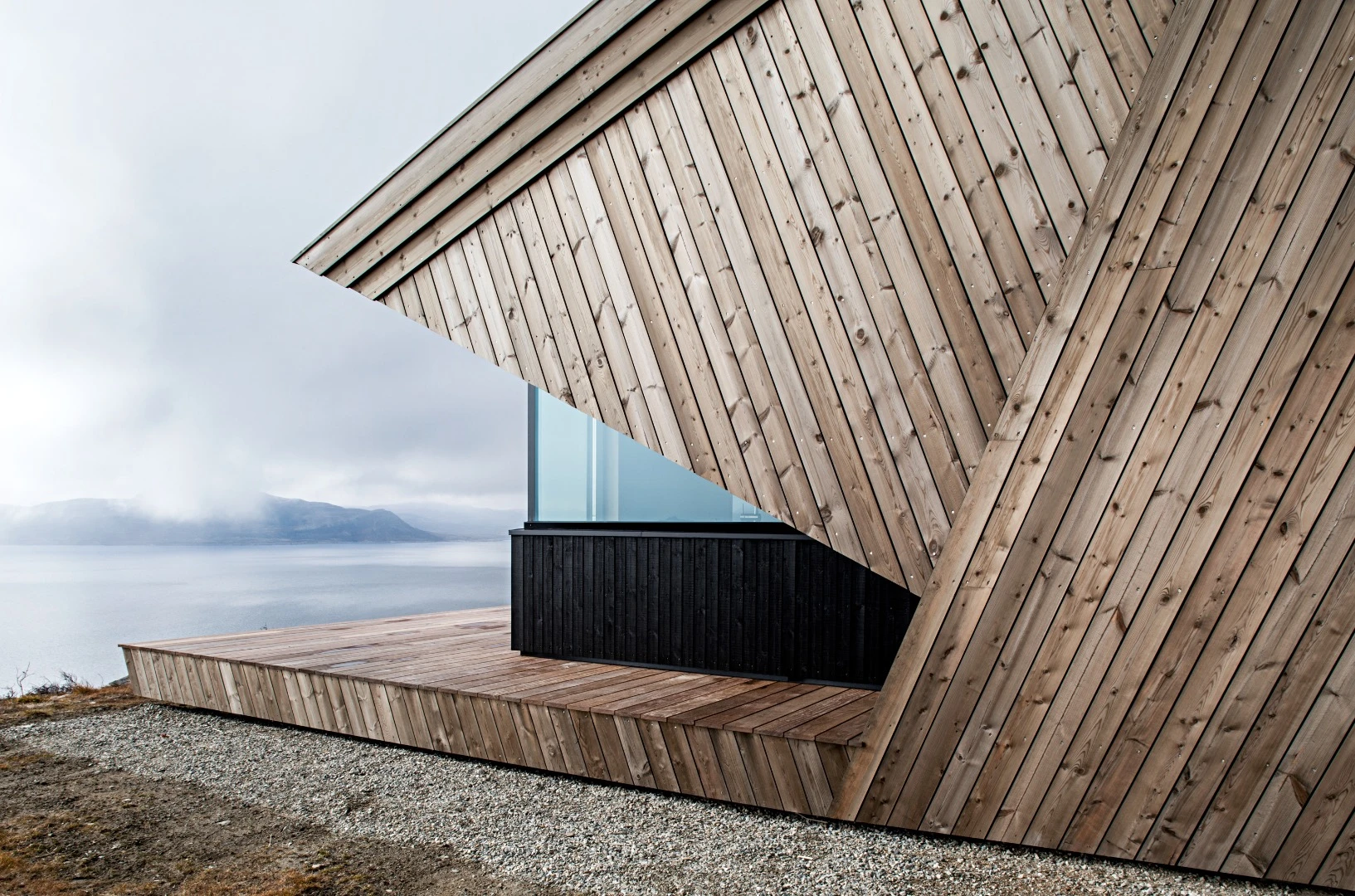 The Hooded Cabin overlooks a lake