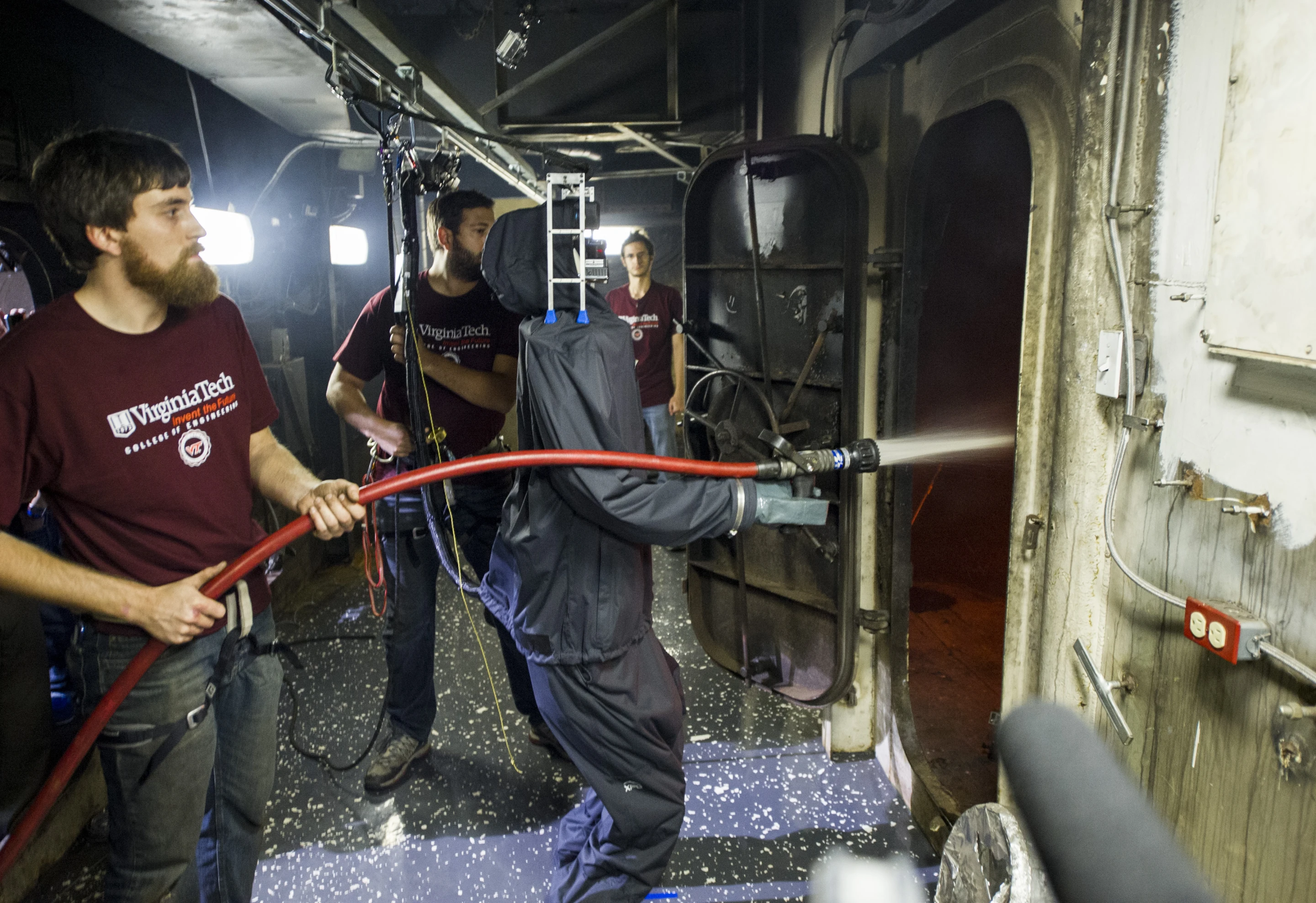 SAFFiR in a rain suit putting out a shipboard fire (Photo: US Navy)