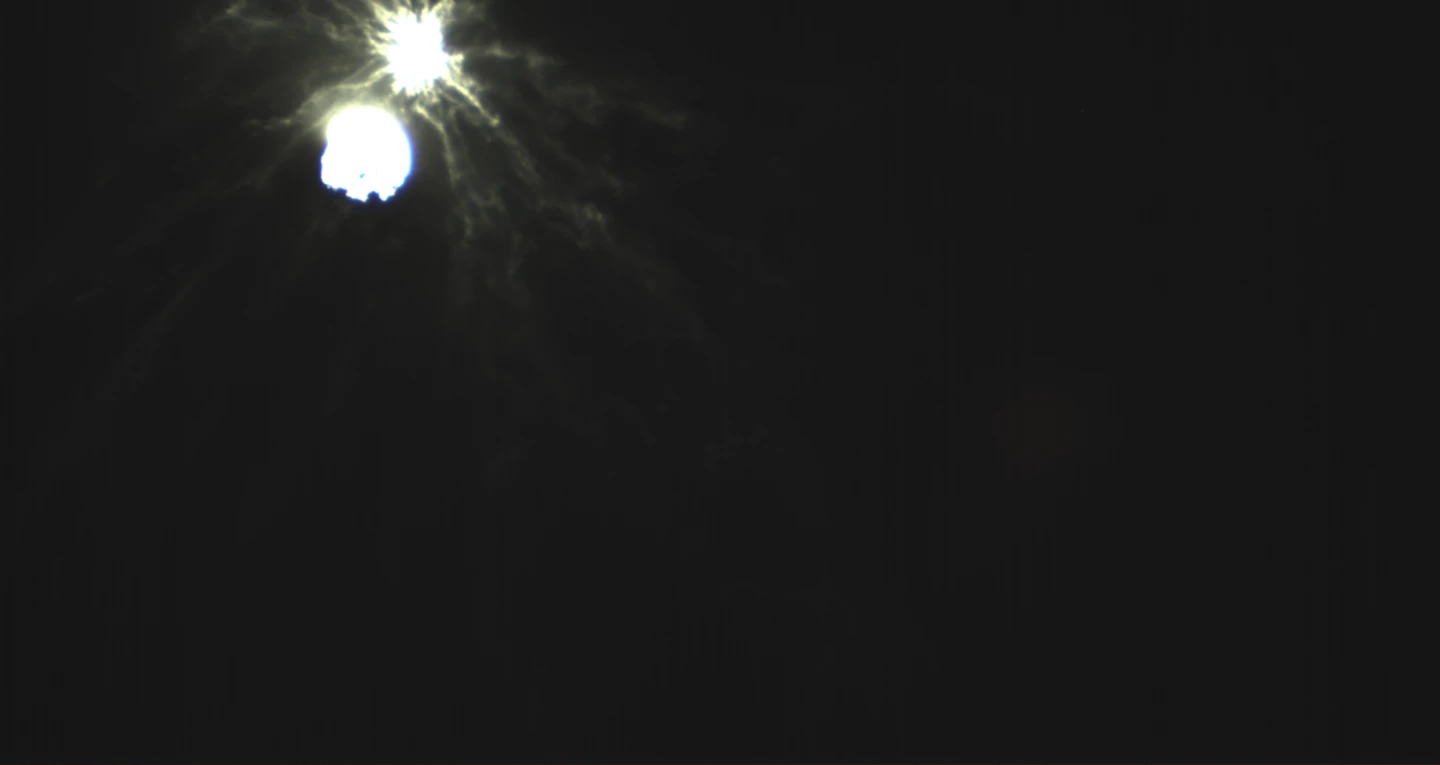 The plume of ejected material viewed from a distance as the DART spacecraft struck the Dimorphos asteorid