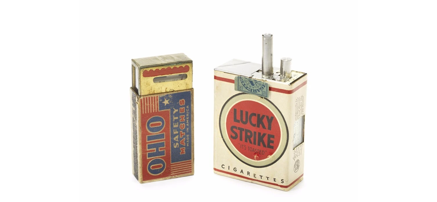 The spy camera was disguised as a cigarette pack and the light meter as a match box