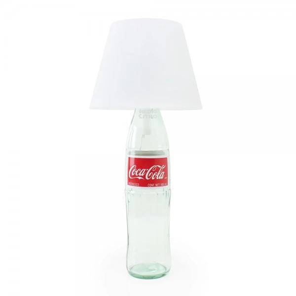 The Satechi Touch USB LED Lamp looks at home when paired with an empty pop bottle