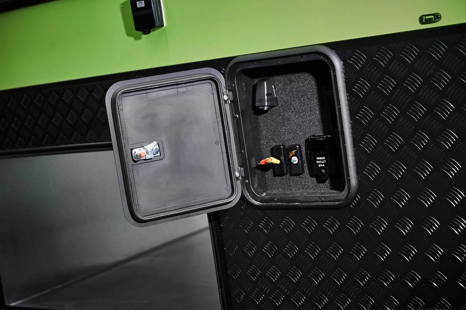 This exterior hatch lets you mount and connect the TV outside