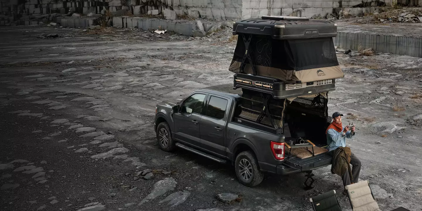 Use the pickup bed to carry cargo during the ride then as a lounge, dining area, drone launch platform, mobile office space or all of the above