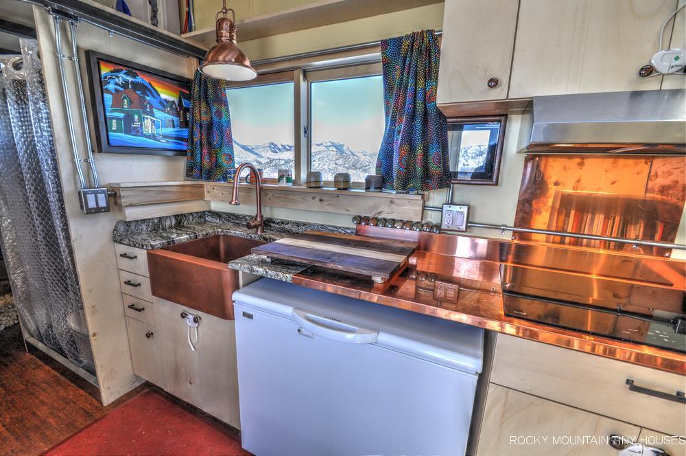 The Tucson's kitchen includes an efficient fridge