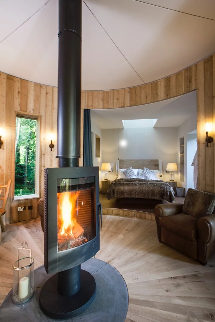 The Woodsman's Treehouse boasts a neat revolving fireplace