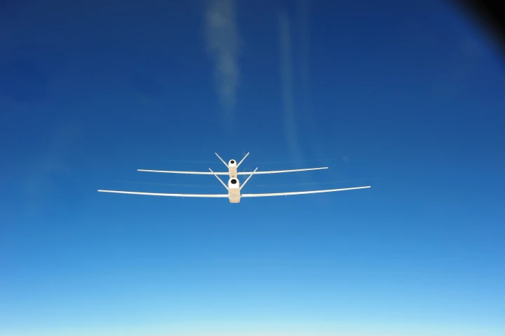 The two NASA Global Hawk UAVs flying in close formation