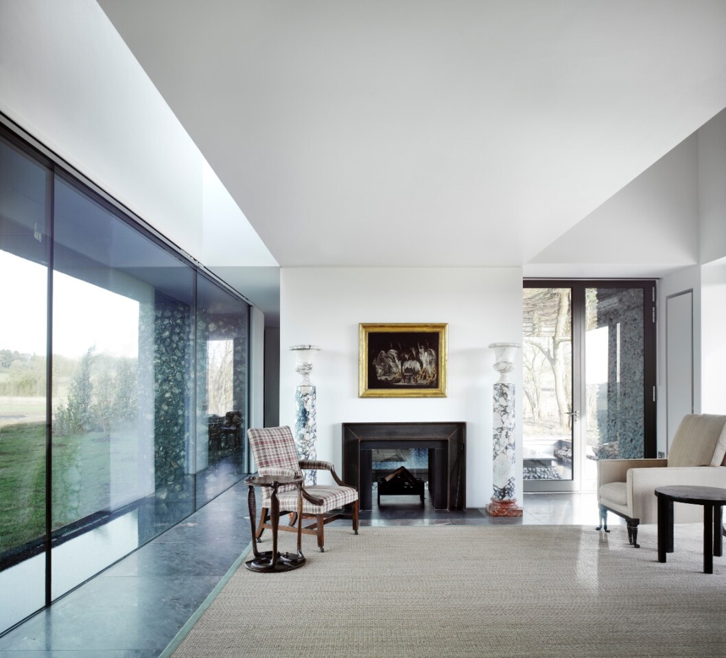 You'd be concerned about such a home proving frigid and unlivable, and indeed, Flint House's neutral interior flirts with this fate