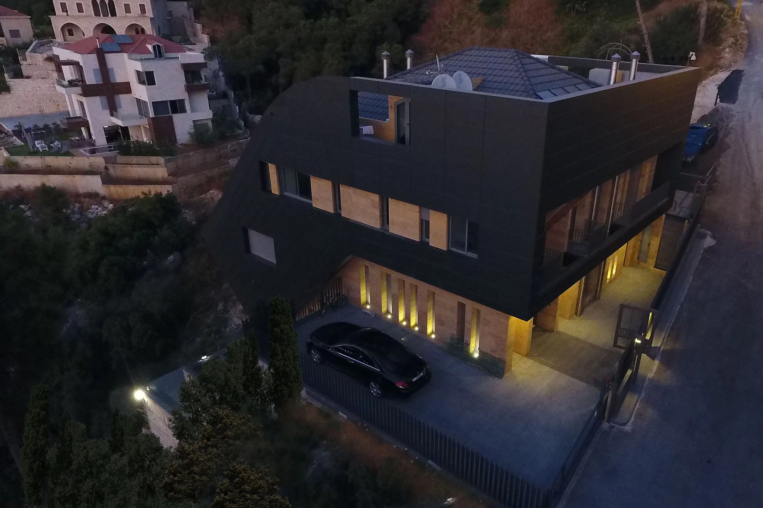 The CH730 Villa is situated on a 810 sq m (8,718 sq ft) plot on the edge of a cliff in Channiir, Mount Lebanon