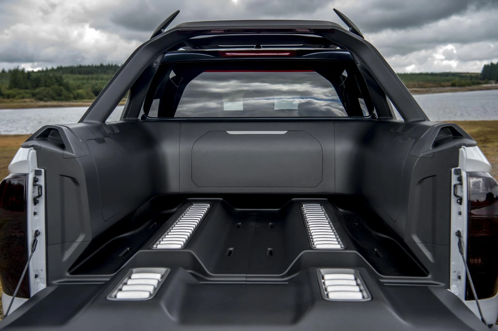 Nissan has upgraded the pickup bed with a heavy-duty polymer liner and docks for spare battery packs, among other things