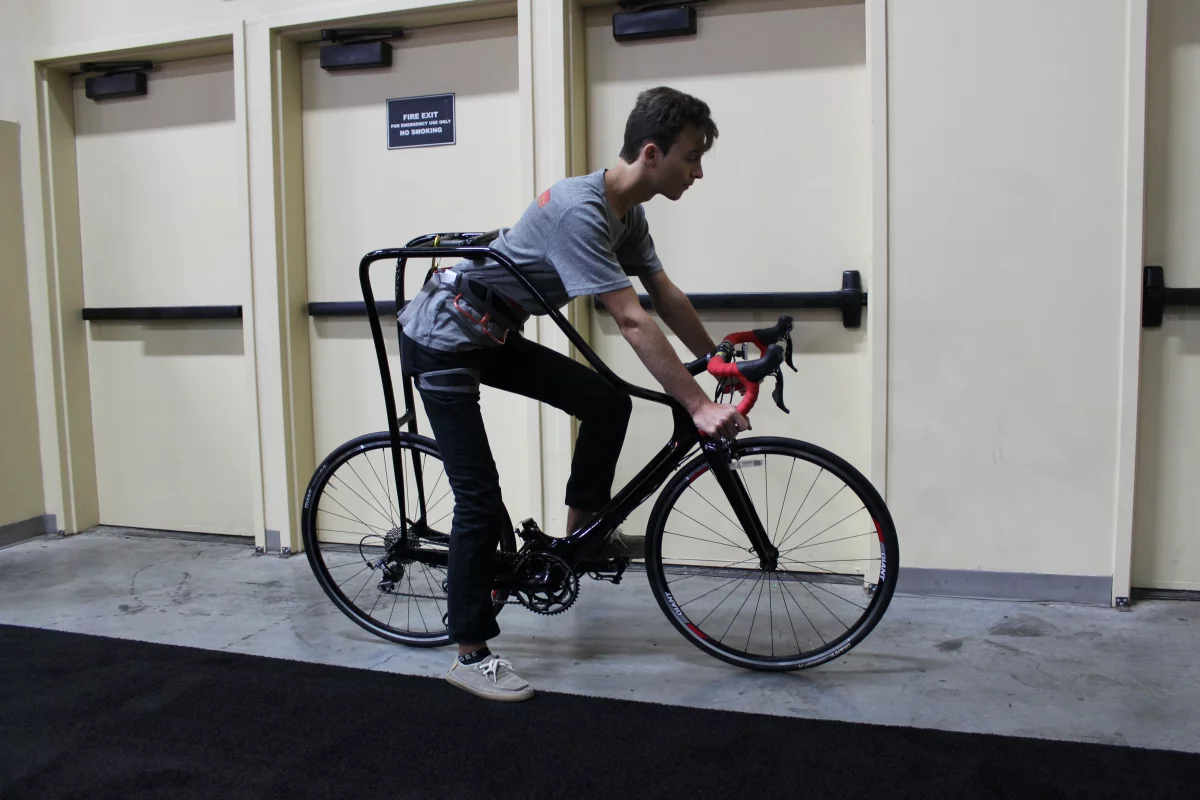 Inventor David Schwartz's son Daniel shows us the Flying Rider at Interbike