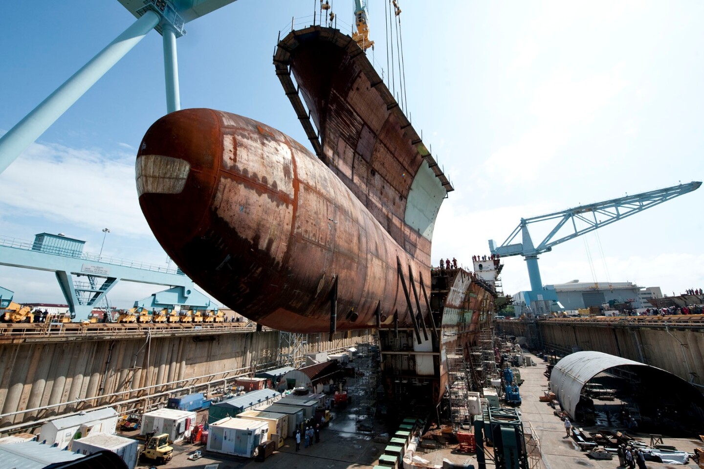 Bow section of teh USS Gerald R Ford being lowered