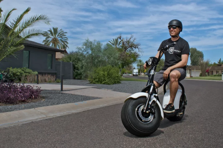 The Phatty scooter rides on 18 x 9.5 inch tubeless fat tires