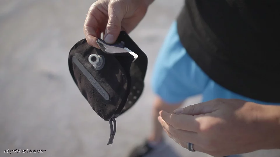 A 4.5 x 5.5-inch therma-cool lined pouch is incorporated into an adjustable strap that's secured around the upper arm with micro Velcro