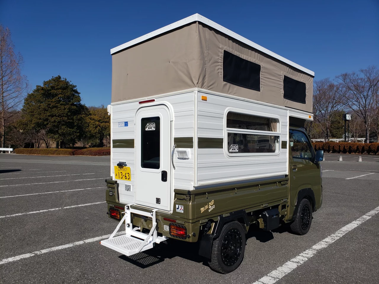 Campers can access the interior directly from the driver cab or through the rear door