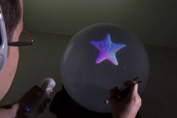 Spheree presents 3D models in a fish bowl-like display, which responds to changes in the viewer's perspective