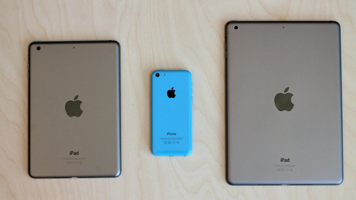 The iPhone 5c next to the iPad mini with Retina Display and iPad Air