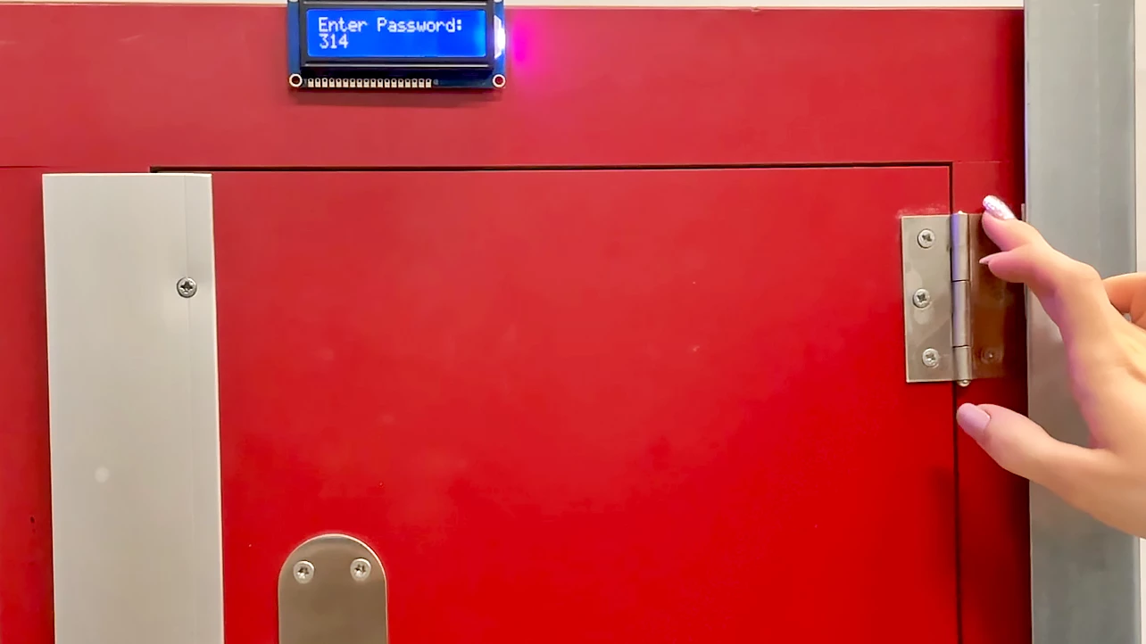 Adhered over a door hinge, the input device (although not its screen) would be virtually invisible to thieves