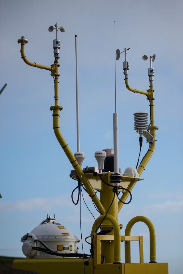 Meteorological instruments on the buoys include anemometers (small white spinning cups on towers) and LIDAR (large white ball at bottom), among others (Photo: PNNL)
