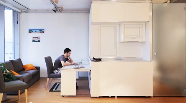 The CityHome unit is designed to transform smaller spaces into larger more usable rooms by concealing key items like a desk, bed, dining room table, etc.