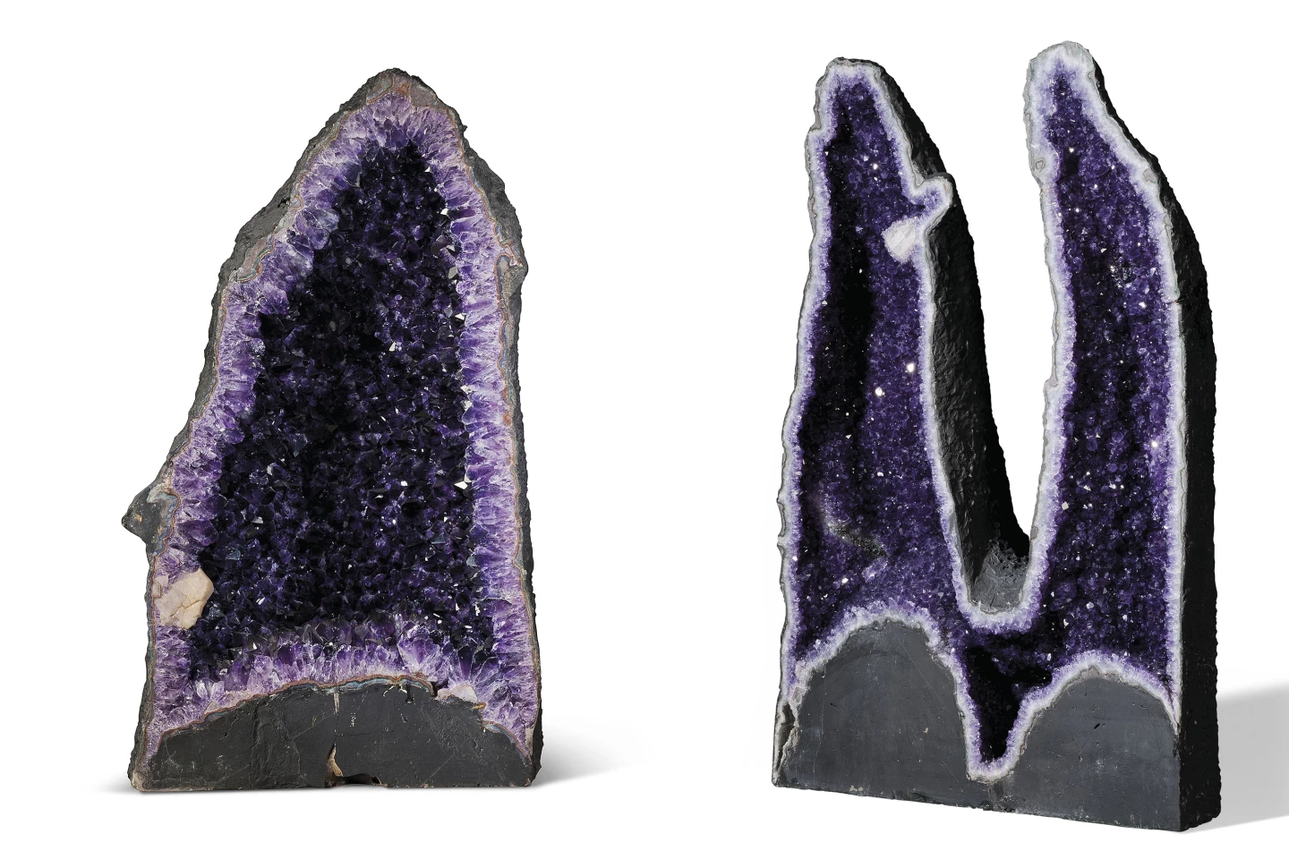 Amethyst Geodes are far from rare, and can be found all over the world within volcanic rocks, though large and beautiful examples command a premium. These two examples are both from the Rio Grande Do Sul region of Brazil, one of the world’s most abundant resources of amethyst. They stand 31 inches (78.5 cm) and 34 inches (87 cm) tall respectively.