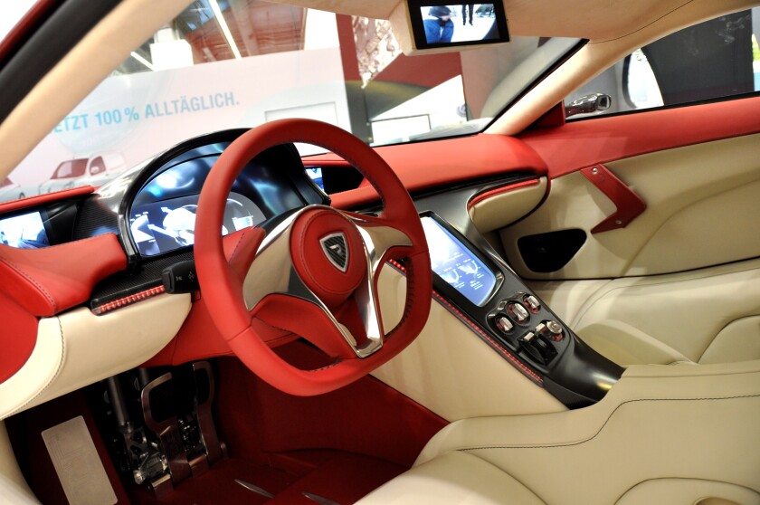 Driver-focused interior features a head-up display