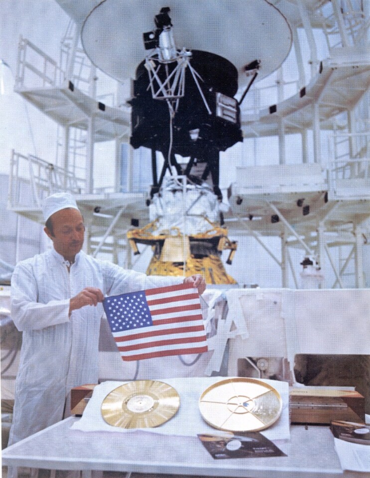 The Voyager golden record and a US flag that also flew on the missions