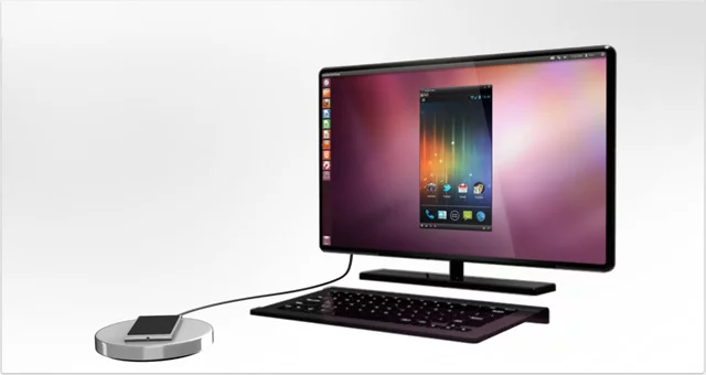 The NexPhone docked with a monitor and keyboard