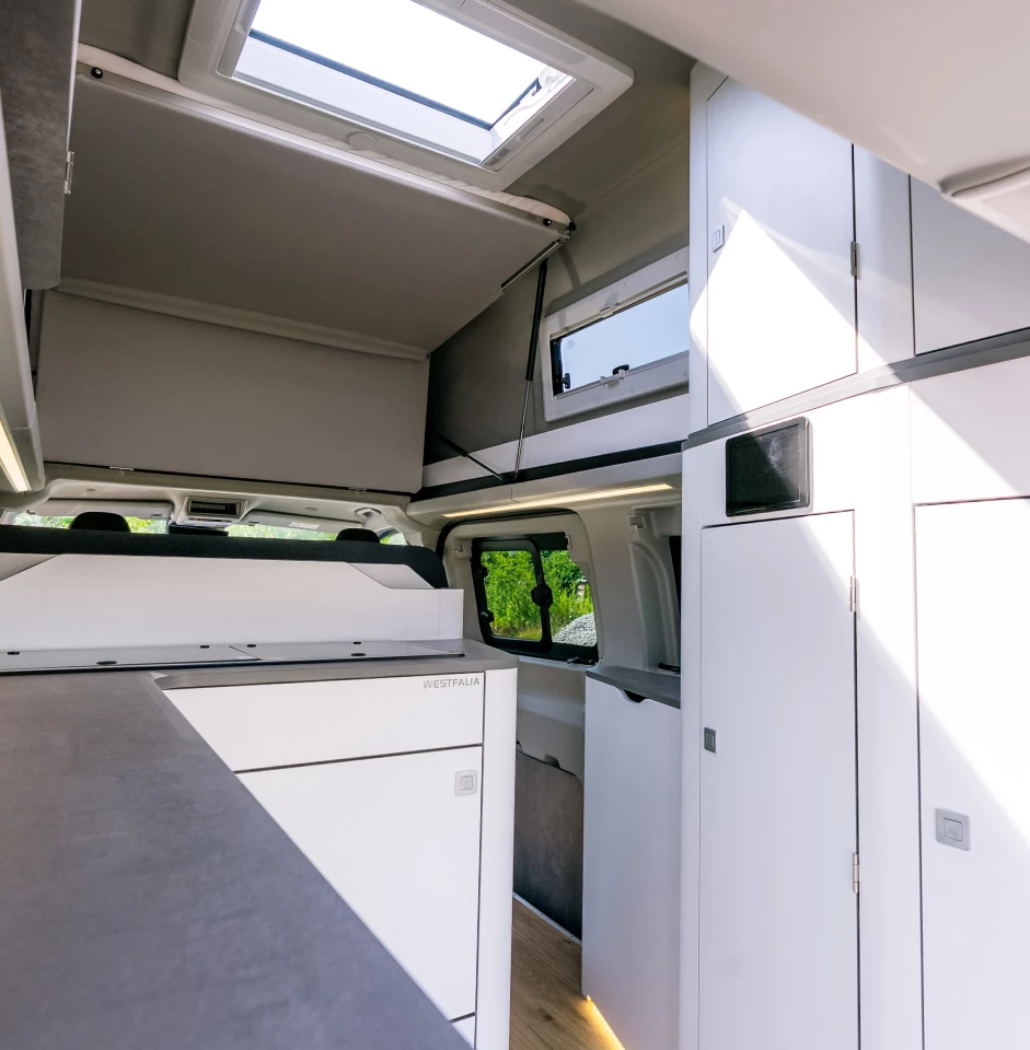 The upper bed includes a split-folding system to clear plenty of standing height