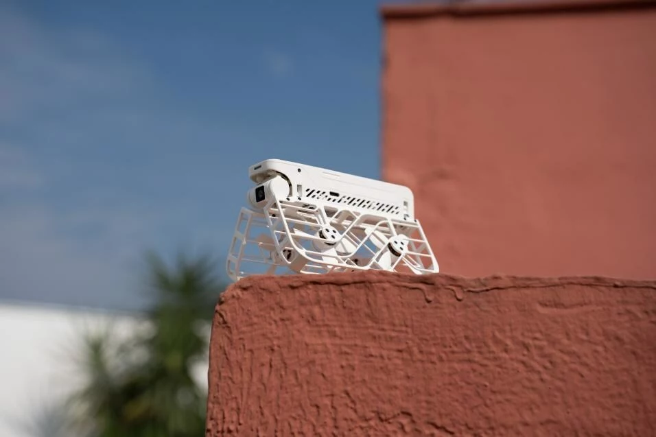 The Hover Camera X1 drone, pictured here folded partway down