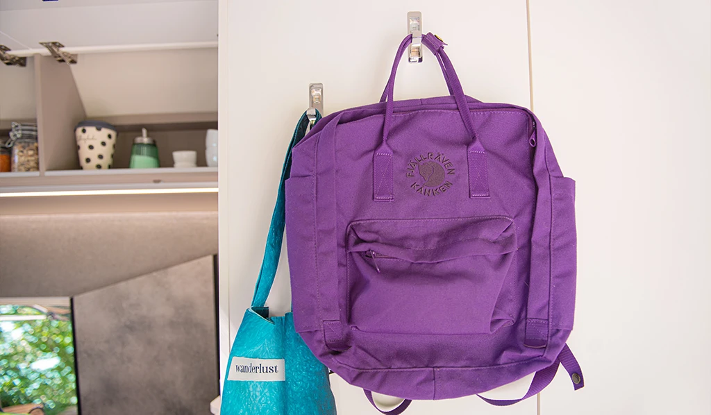 Coat hooks provide a homey touch