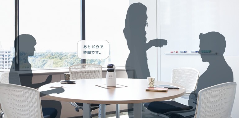 Robotalk helps out during office meetings by checking the internet when necessary and by keeping track of time