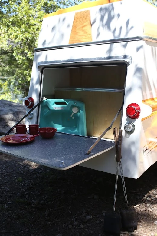 The tailgate provides space for gear and food prep