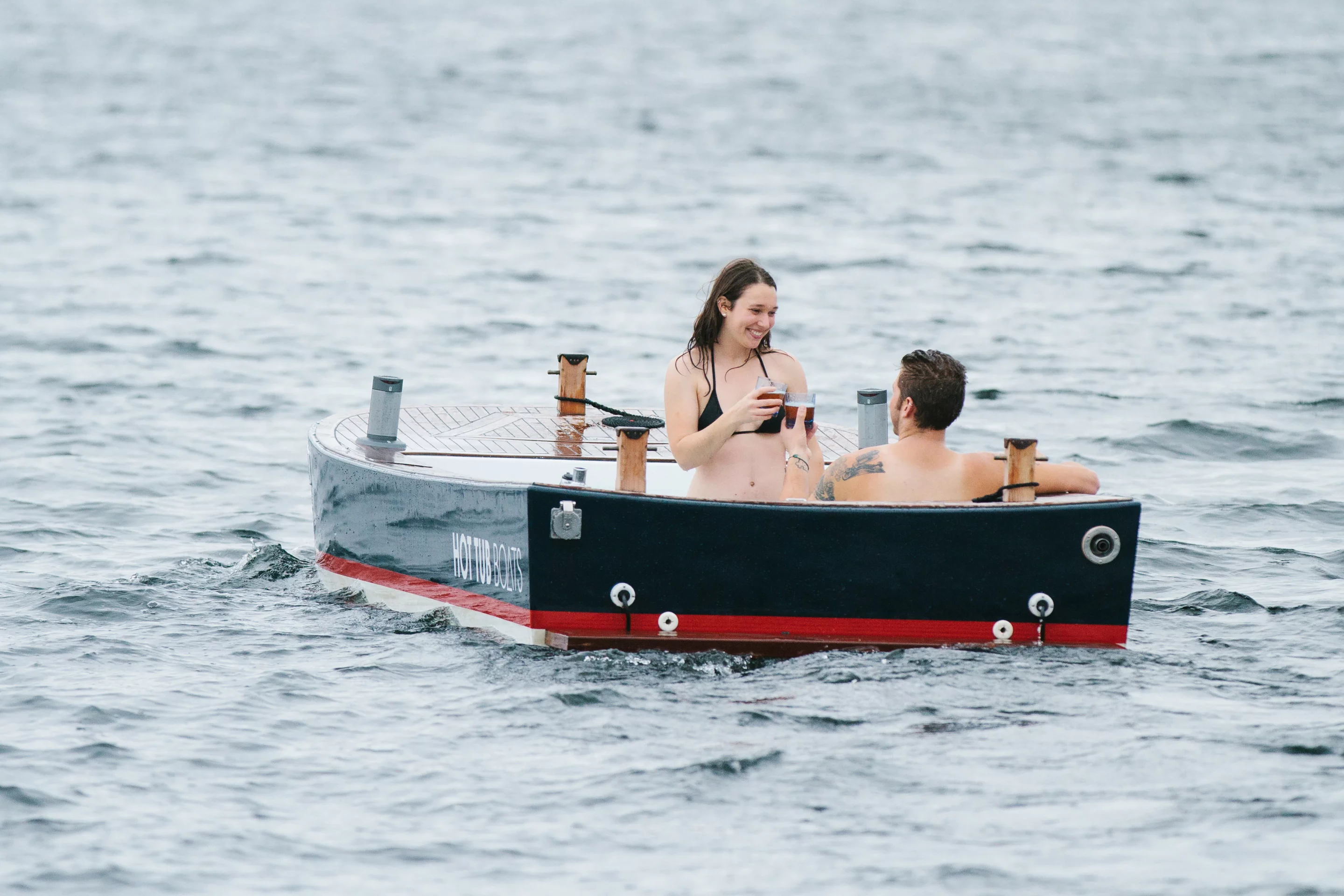 The Hot Tub Boat allows its passengers to soak while they cruise